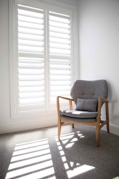 A colourful and bright image of luxurious Plantation Shutters.