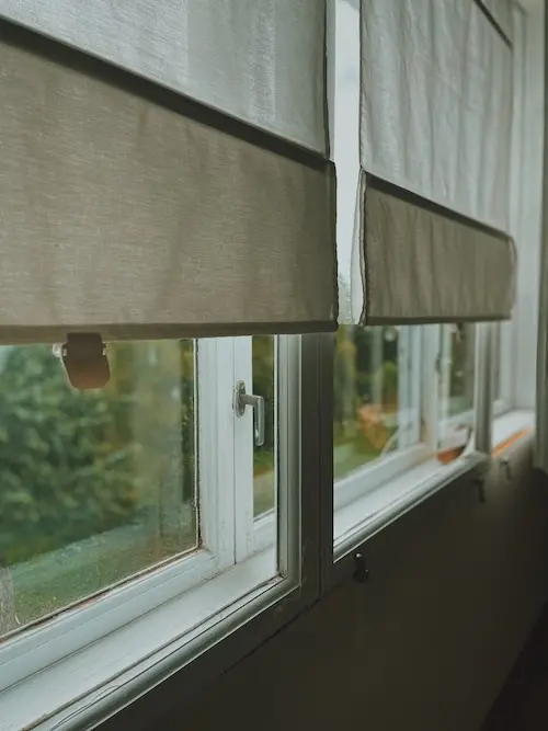 A colourful and bright image of luxurious Roman Blinds.